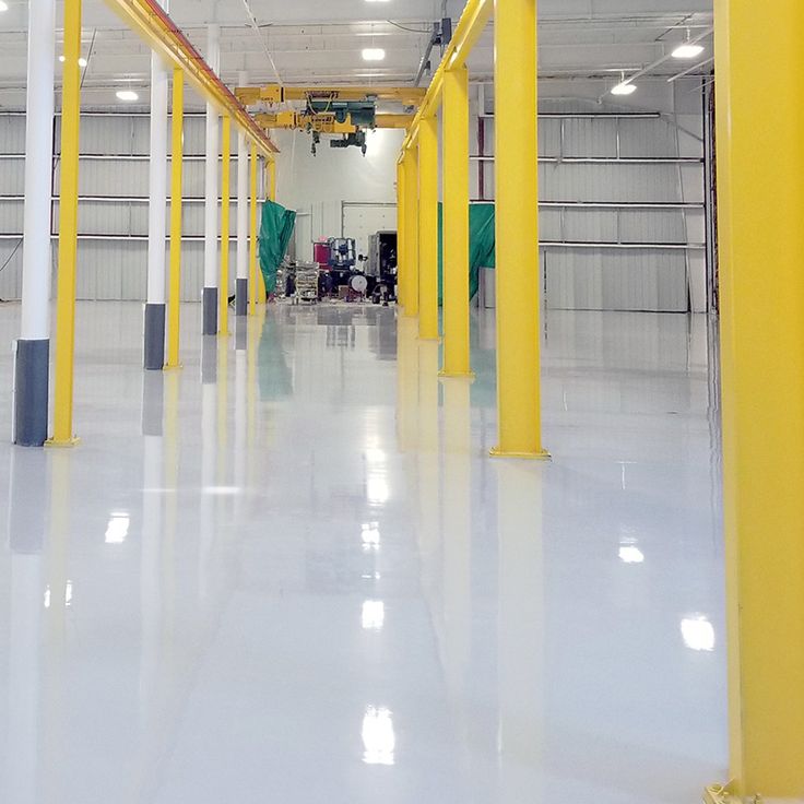 cleared warehouse with epoxy flooring