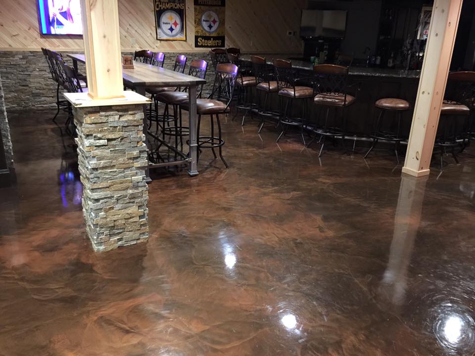 restaurant floors with chairs and tables with a bar